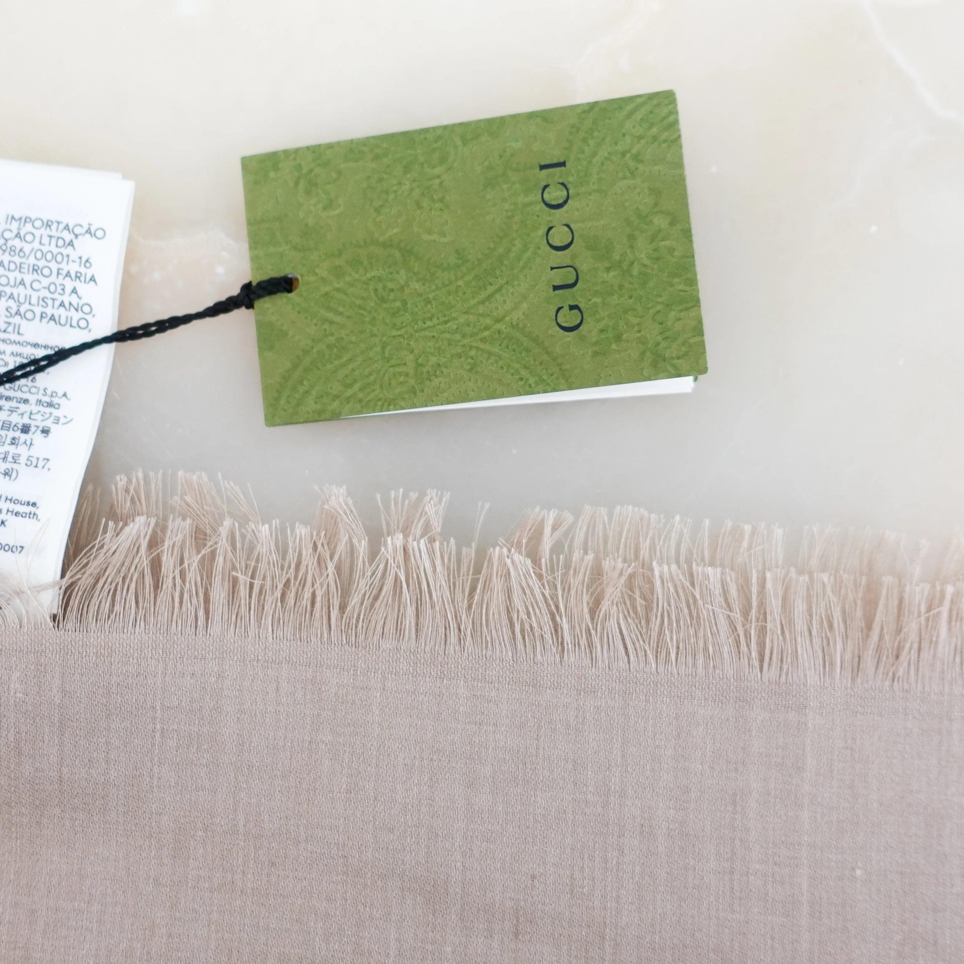Beige monogram scarf £225