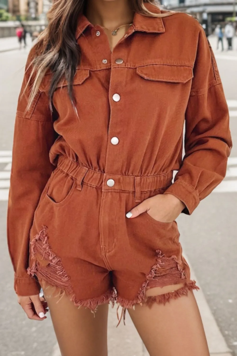 Edgy Distressed Denim Snap Romper with Raw Hem
